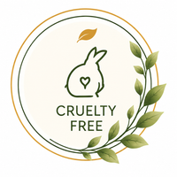 A circular cruelty-free logo graphic featuring a rabbit outline with a heart, green leaves and branches, and the words 'CRUELTY FREE' on a light cream background with a thin gold ring.