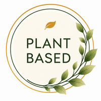 A circular graphic with the words “PLANT BASED” in dark green serif text, surrounded by green leaves and a gold inner ring on a white background.